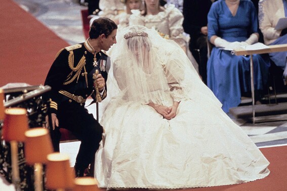 Designers of the late Princess Diana’s wedding dress settle dispute over drawings of the gown