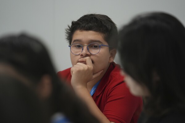 Young people, whose futures are at stake in UN climate talks, push through anger to fight for hope