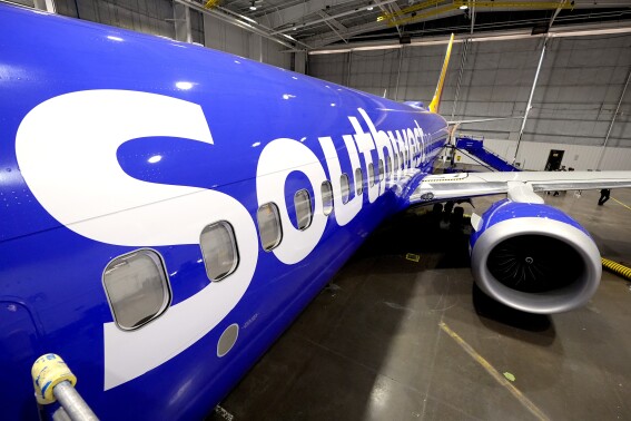 Southwest Airlines says it is ending cabin service earlier to reduce chance of injury